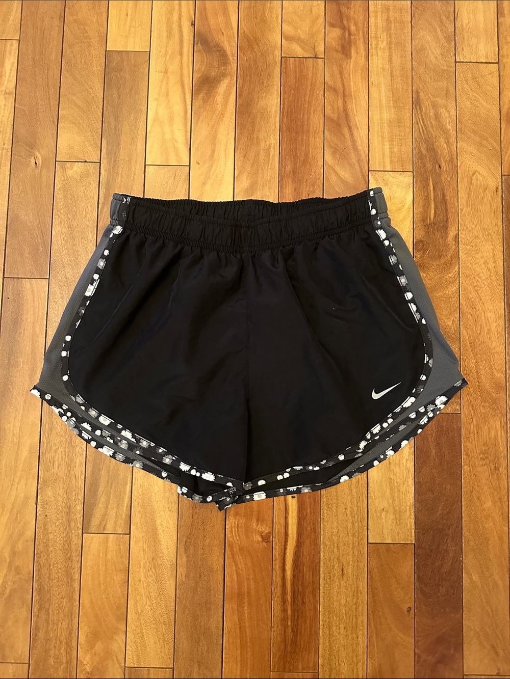 Nike Black Athletic Running Shorts with Gray Trim and White Swoosh